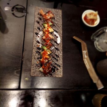 Yuubi Japanese Restaurant - a wooden table with food on it - Japanese Near Me - San Francisco, California Yuubi Japanese Restaurant - a wooden table with food on it - Japanese Near Me - San Francisco, California
