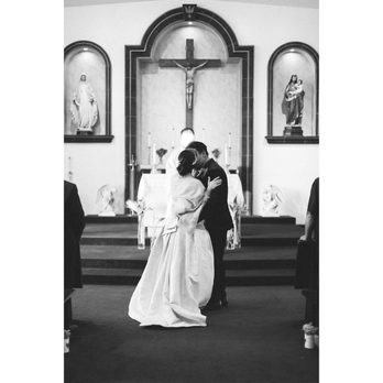 Luis Cubas Photography - Best angle of our first kiss at the church, no close-ups, no stained window lighting, he tossed in a BW copy for every shot. - Event Photography Near Me