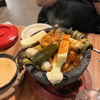 Los Dos Potrillos - Molcajete- this wasn't ours, the table next to us ordered it and it came out smoking and looked delicious. Might try next time! - Mexican Near Me - Castle Rock, Colorado Los Dos Potrillos - Molcajete- this wasn't ours, the table next to us ordered it and it came out smoking and looked delicious. Might try next time! - Mexican Near Me - Castle Rock, Colorado