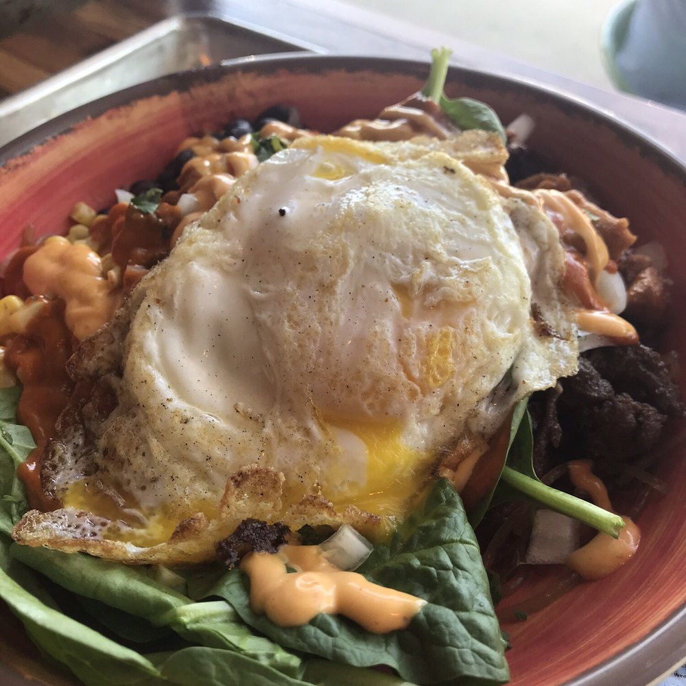 Chi'Lantro - Noodle bowl with black beans, rib eye, spicy chicken, spinach, corn , and a fried egg. The sauces and the chicken were the stars. - Korean Near Me - Austin, Texas Chi'Lantro - Noodle bowl with black beans, rib eye, spicy chicken, spinach, corn , and a fried egg. The sauces and the chicken were the stars. - Korean Near Me - Austin, Texas