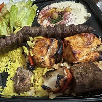 Falafel & Grill - Whoops.. half gone in our tummy... it's the Combination Meat Plate - Middle Eastern Near Me - Lincolnwood, Illinois