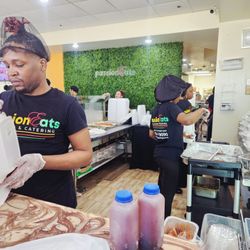 Passion Eats Catering - Some of the staff working hard to serve the large crowd.