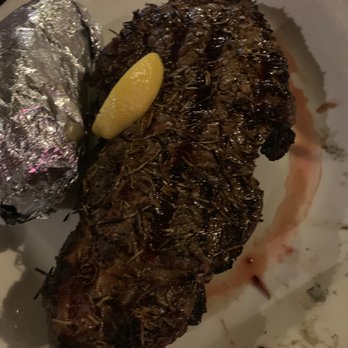 Murphy's Steakhouse - 10 oz Tuscan Ribeye. Seasoned with rosemary, garlic, and lemon. Turns out, it wasn't very good. A tough steak. - Steakhouses Near Me - Winchester, Texas