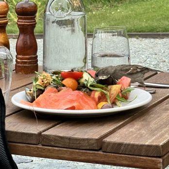 Walter Peak Farm - Table of appetizer meat seafood etc. - Tours Near Me