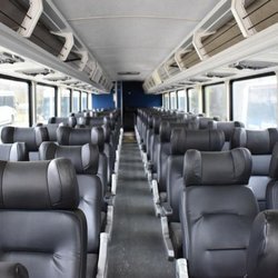 Greyhound Bus Lines - Interior of a Newer Greyhound Bus. It has improved Luggage Racks, Temperature Controls, Headrests, & Reading Lights.