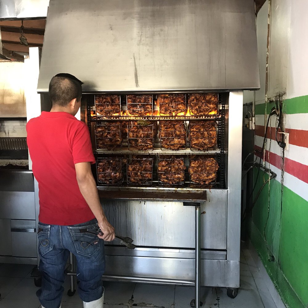 Pollito Ranchero - Tending to that yummy golden chicken!!! - Mexican Near Me - Puerto Escondido, OAX