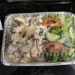 Mukhshaf Noor - Combo over rice (lamb (gyro) and chicken) with white sauce and hot sauce. Chicken and lamb were very well seasoned.