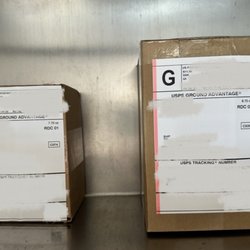 United States Post Office - Proof that I just spent time at their machine printing labels and that a little piece of tape on both of the labels would've been nice.