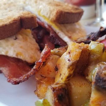 Sidewalk Cafe - Breakfast sandwich with venice potatoes. - Tacos Near Me - Venice, California