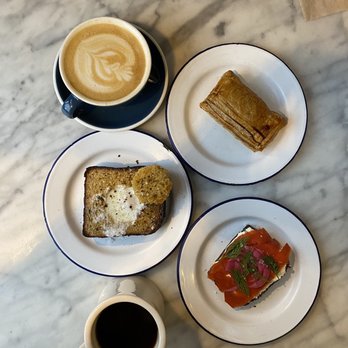 The Mill - Oat latte, Neighbor guava pastelito, egg toast, salmon toast (on adv bread) - Coffee & Tea Near Me - San Francisco, California The Mill - Oat latte, Neighbor guava pastelito, egg toast, salmon toast (on adv bread) - Coffee & Tea Near Me - San Francisco, California