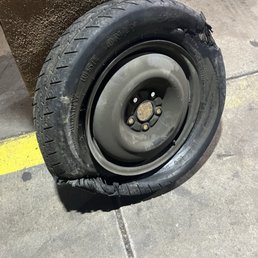 my spare that blew attached to my rim. the spare they tried to sell us looked exactly like this (minus the blow out lolol) my spare that blew attached to my rim. the spare they tried to sell us looked exactly like this (minus the blow out lolol)