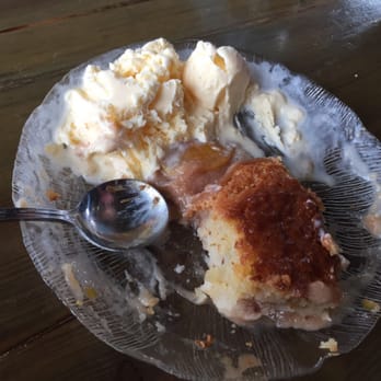 Skipper's Fish Camp - Peach cobbler with vanilla ice cream... We couldn't stop eating it ;) - Seafood Near Me - Darien, Georgia Skipper's Fish Camp - Peach cobbler with vanilla ice cream... We couldn't stop eating it ;) - Seafood Near Me - Darien, Georgia