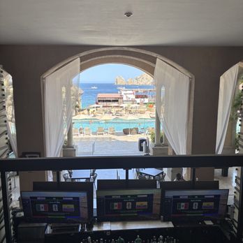 Casa Dorada - View from the hotel entrance overlooking the bar and pool - Venues & Event Spaces Near Me - Cabo San Lucas, BCS Casa Dorada - View from the hotel entrance overlooking the bar and pool - Venues & Event Spaces Near Me - Cabo San Lucas, BCS