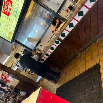 Tokyo Express - a man standing in front of a fast food restaurant - Japanese Near Me - Salem, Virginia Tokyo Express - a man standing in front of a fast food restaurant - Japanese Near Me - Salem, Virginia