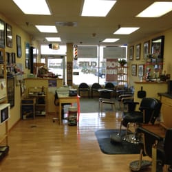 Sports Themed Barbershop. Watch sports while get your haircut.