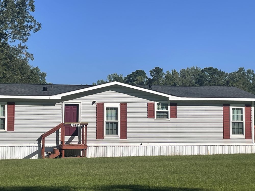 Slide of N&S Roofing