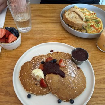 Tangerines Kitchen - Crab omelette, mixed berry pancakes, side of fruit, and Thai tea - Breakfast & Brunch Near Me - Charlottesville, Virginia