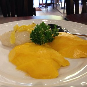 Photo of The Coconut Midtown - Sacramento, CA, United States. Dessert - Sticky Coconut Sticky Rice with Mango