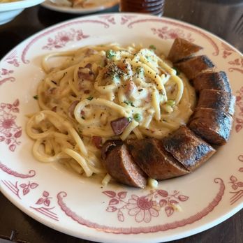 Sortino's Italian Kitchen - Bucatini Carbonera with a sausage link - Italian Near Me - Round Rock, Texas Sortino's Italian Kitchen - Bucatini Carbonera with a sausage link - Italian Near Me - Round Rock, Texas
