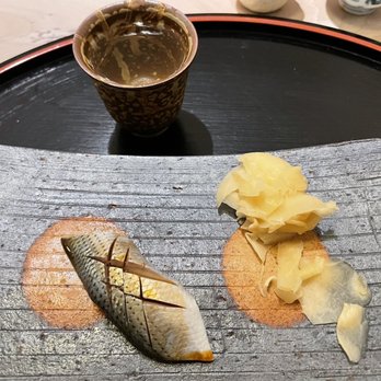 Kaiseki Furukawa - a piece of fish on a cutting board - Japanese Near Me - Minneapolis, Minnesota Kaiseki Furukawa - a piece of fish on a cutting board - Japanese Near Me - Minneapolis, Minnesota