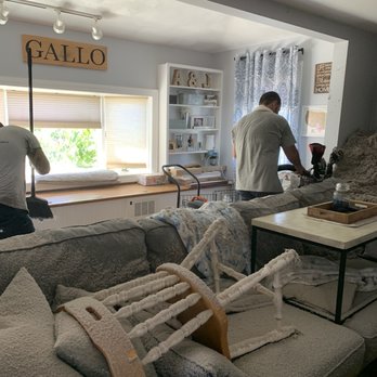 Insul-Kings - two men working in a living room - General Contractors Near Me - Lowell, Massachusetts