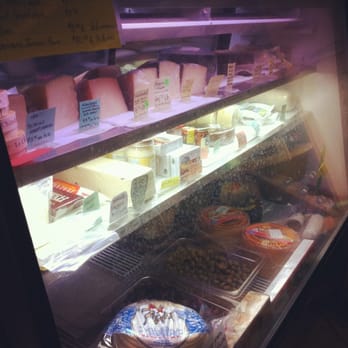 Oliver - Deli case full of Jamon (cured ham) and Spanish cheeses and other delights! - Beer, Wine & Spirits Near Me - Honolulu, Hawaii