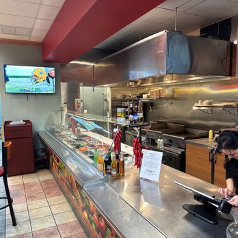 Tacos Chisco - a woman ordering food at a restaurant - Tacos Near Me - Glendale, Arizona Tacos Chisco - a woman ordering food at a restaurant - Tacos Near Me - Glendale, Arizona