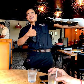 Fuego Mexican Grill - This is Juan, delivering our entrees on his arm. That's five big, hot dinners. Ole Juan! - Tacos Near Me - Cromwell, Connecticut Fuego Mexican Grill - This is Juan, delivering our entrees on his arm. That's five big, hot dinners. Ole Juan! - Tacos Near Me - Cromwell, Connecticut