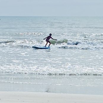 Nex Generation Surf School - 8 year old catching her very first wave & on her first try! - Surf Schools Near Me - Cocoa Beach, Florida Nex Generation Surf School - 8 year old catching her very first wave & on her first try! - Surf Schools Near Me - Cocoa Beach, Florida