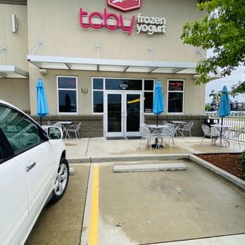 TCBY Camellia Square - a car parked in front of a restaurant - Ice Cream & Frozen Yogurt Near Me - Slidell, Louisiana