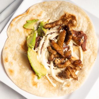 Honduras Kitchen - Chuleta and Avocado  Baleada - Latin American Near Me - Long Beach, California