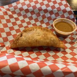 Picadillo Empanada w/ spicy sauce