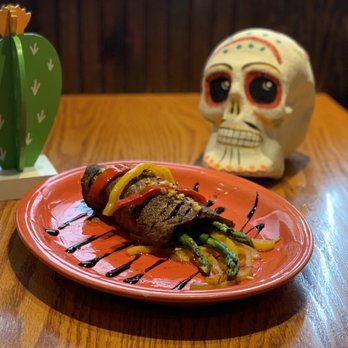 La Charreada Bloomington - a plate of food on a table - Mexican Near Me - Bloomington, Indiana La Charreada Bloomington - a plate of food on a table - Mexican Near Me - Bloomington, Indiana