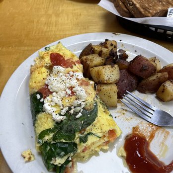 Flakowitz Bagel Inn - Half-eaten Greek Omelette - Bagels Near Me - Boca Raton, Florida Flakowitz Bagel Inn - Half-eaten Greek Omelette - Bagels Near Me - Boca Raton, Florida
