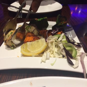 Dum Pukht - Chicken mix platter. Pretty good but I expected it on that sizzling plate. Don't come here on busy days like Mother's Day etc. - Indian Near Me - Markham, Ontario
