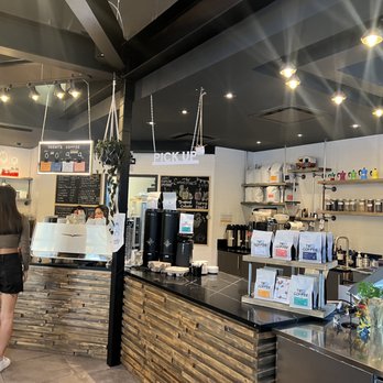 Tru Cafe - a couple of people standing at the counter - Ice Cream & Frozen Yogurt Near Me - Vancouver, British Columbia Tru Cafe - a couple of people standing at the counter - Ice Cream & Frozen Yogurt Near Me - Vancouver, British Columbia