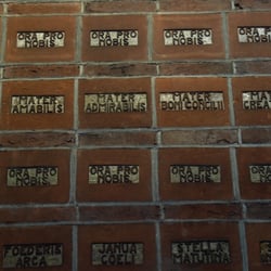 Onze Lieve Vrouw van Lourdeskapel - Regina Pacis - partial view of the chapel's unique example of the "Litany of Loreto" baked into handformed brickstones.
