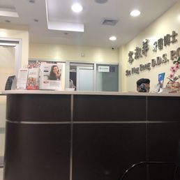 Entrance into dental office, front counter, and waiting room. Entrance into dental office, front counter, and waiting room.