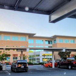 Kaiser Permanente Family Health Center - Front, parking lot with solar panels