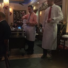 The cook doing table side service