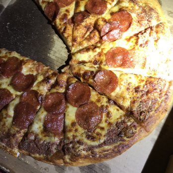 Outer Limits - a pepperoni pizza in a box - American Near Me - Iron River, Michigan