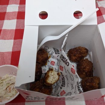Bonchon Mason - 8 piece of Boneless wings with spicy sauce and super small complimentary side of cole slaw - Asian Fusion Near Me - Mason, Ohio