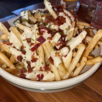 Maison Pickle - Maison Fries with Gruyere Fondue - Cocktail Bars Near Me - New York, New York Maison Pickle - Maison Fries with Gruyere Fondue - Cocktail Bars Near Me - New York, New York