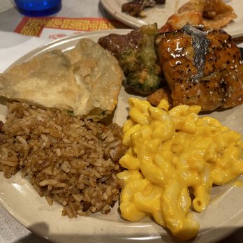 Hong Kong Buffet - A plate with fried rice, macaroni and cheese, a fried dumpling, and glazed fried chicken, served at a Chinese buffet. - Chinese Near Me - Cranston, Rhode Island