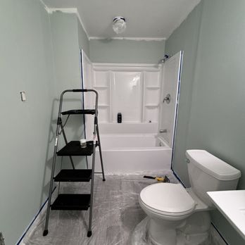 Pinnacle Contracting  - New flooring and Tub Insert - General Contractors Near Me