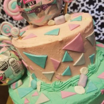 Sweet Success Bakery - a cake with a disco ball on top - Desserts Near Me
