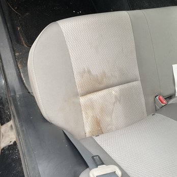 Howie's Auto Detailing - Before pic of stain in backseat - Auto Detailing Near Me - Millis, Massachusetts