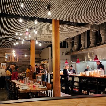 Tavolàta Fremont - View from two top towards host stand and kitchen line (1/22/24) - Italian Near Me - Seattle, Washington