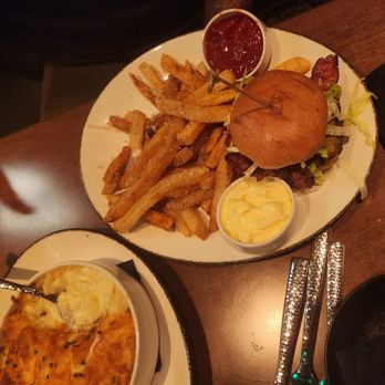 Revel Steak - Burger and fries and scalloped potatoes - Steakhouses Near Me - Detroit, Michigan Revel Steak - Burger and fries and scalloped potatoes - Steakhouses Near Me - Detroit, Michigan
