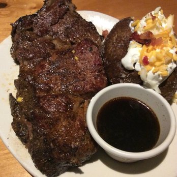 Outback Steakhouse - Prime Rib Cut Rare then marked on the grill - Steakhouses Near Me - Daytona Beach, Florida Outback Steakhouse - Prime Rib Cut Rare then marked on the grill - Steakhouses Near Me - Daytona Beach, Florida